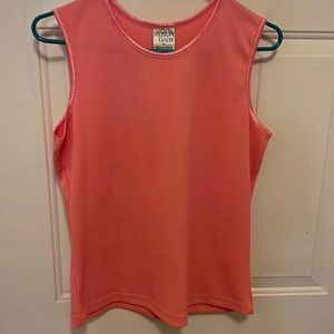 Medium .. teal shirt is petite M.  Shorter in length.